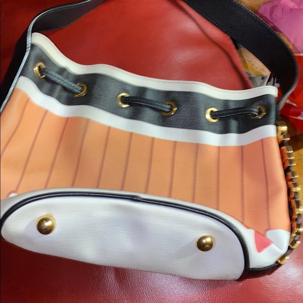 Moschino matches bucket bag!